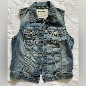 Distressed denim vest